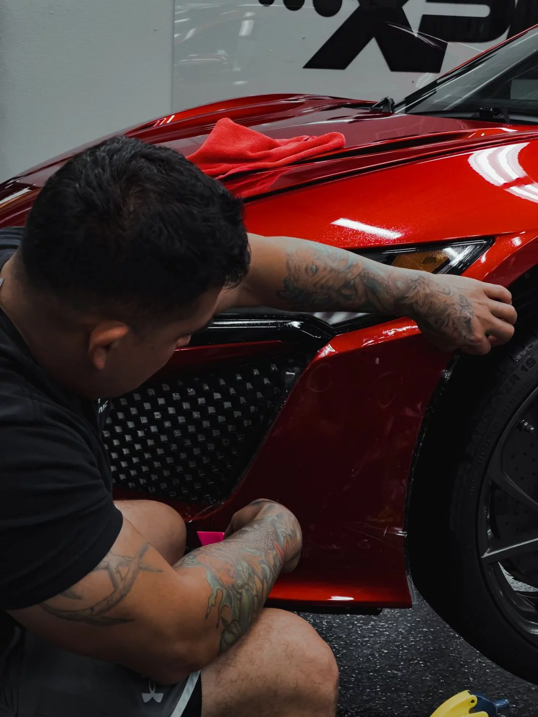 Wrapping a Red Acura NSX in Paint Protection Film